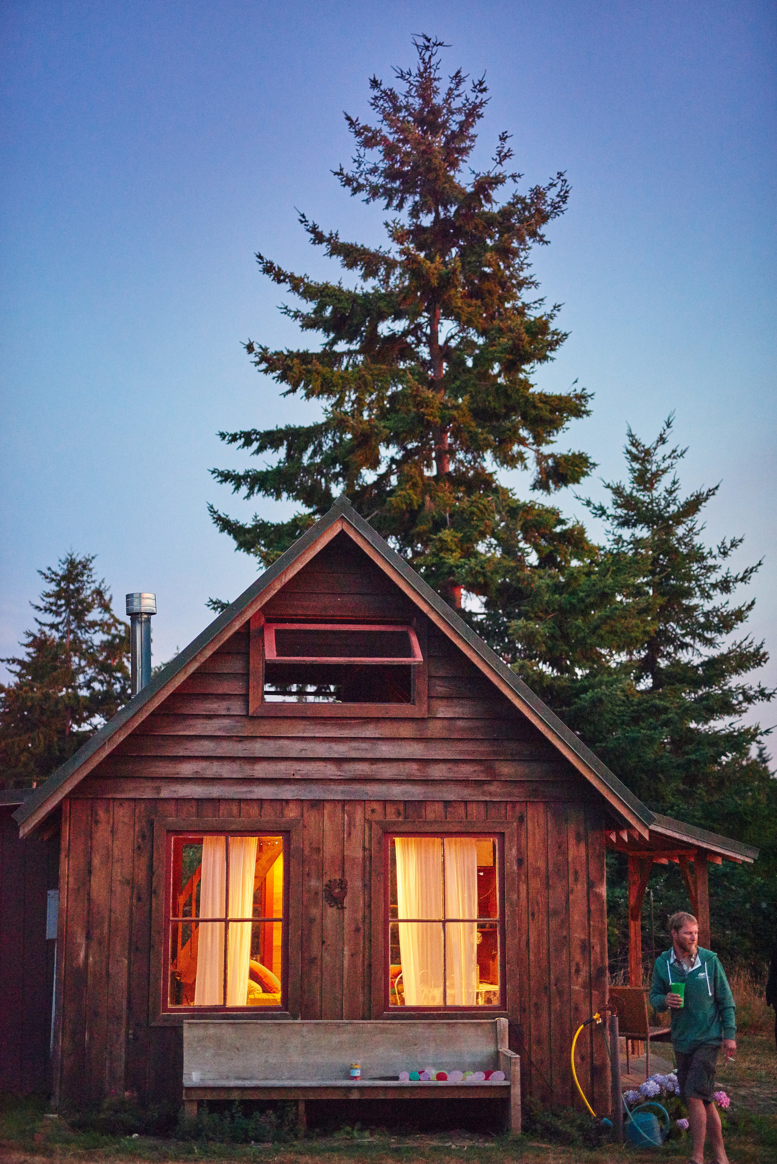 plum nelli homestead tiny home cabin at night.jpg