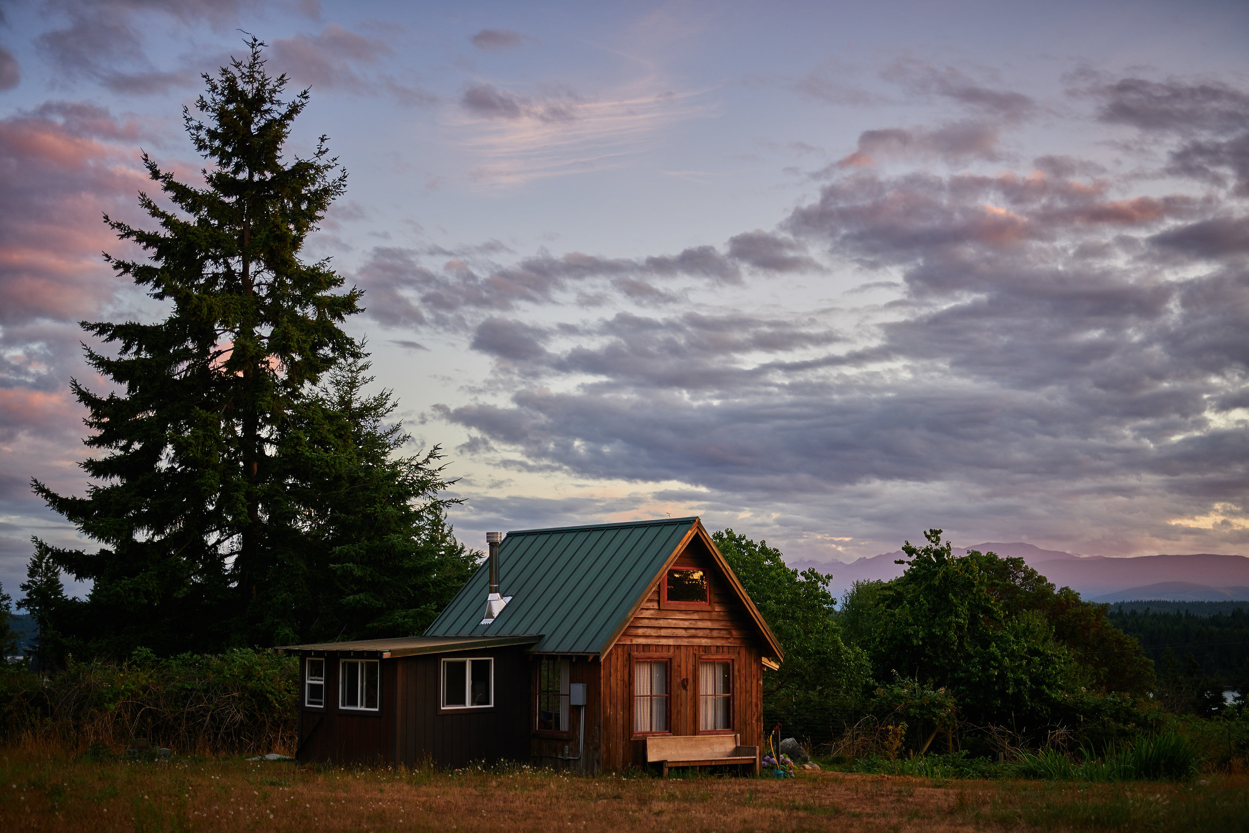 perfect sunset at homestead cabin plum nelli in pac nw.jpg