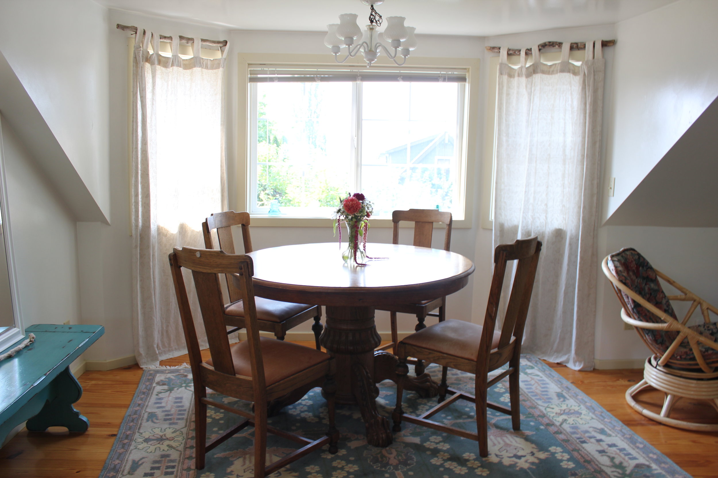 light filled dining room at plum nelli apartment airbnb.JPG