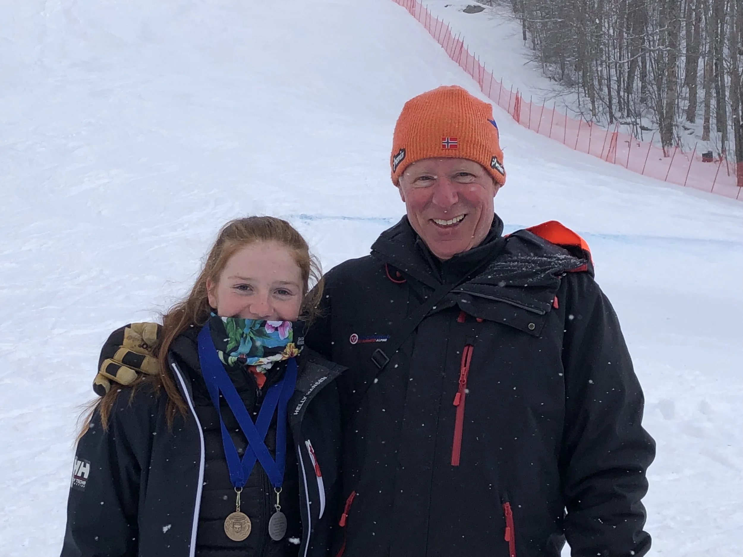 Above: Kelly Gebhardt celebrates with Ski Runners U16/19 Head Coach Scott Smith. Title photo: Kelly Gebhardt, second from left, on the podium today at Pico Ski Club.
