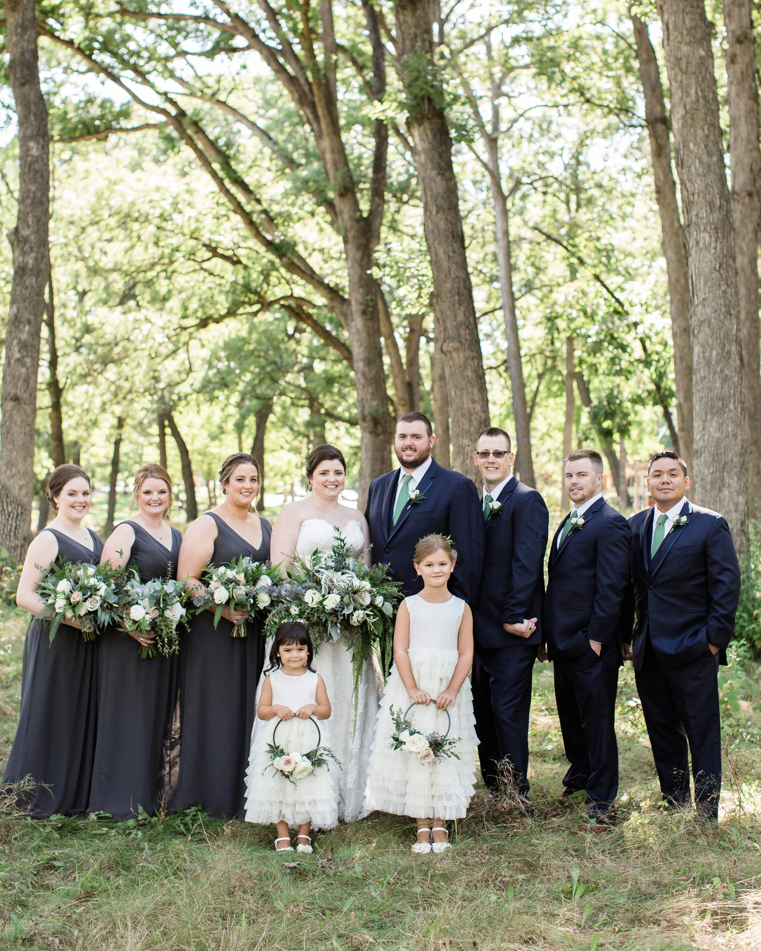 Florals | Allium Floral Hair & Make-Up by The Beauty Team Men’s Attire | Ties - The Tie Bar / Suits - Men’s Warehouse Oakbrook Women’s Attire | Dresses - Bill Levkoff / Necklaces - ForTheMaids on Etsy Image by Grace | True Grace Creative