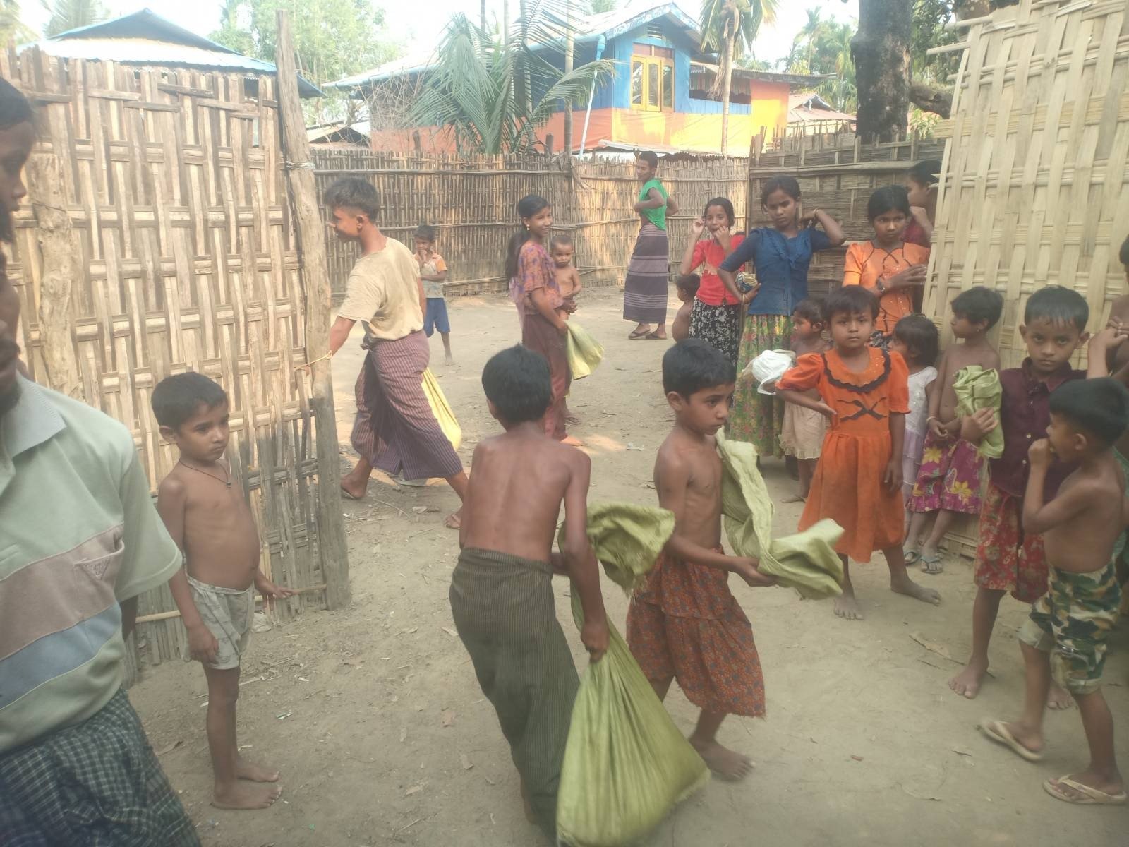 MALNOURISHED CHILDREN RECEIVING AID FROM SFH MEDICS AND FOOD SUPPLIES.jpeg