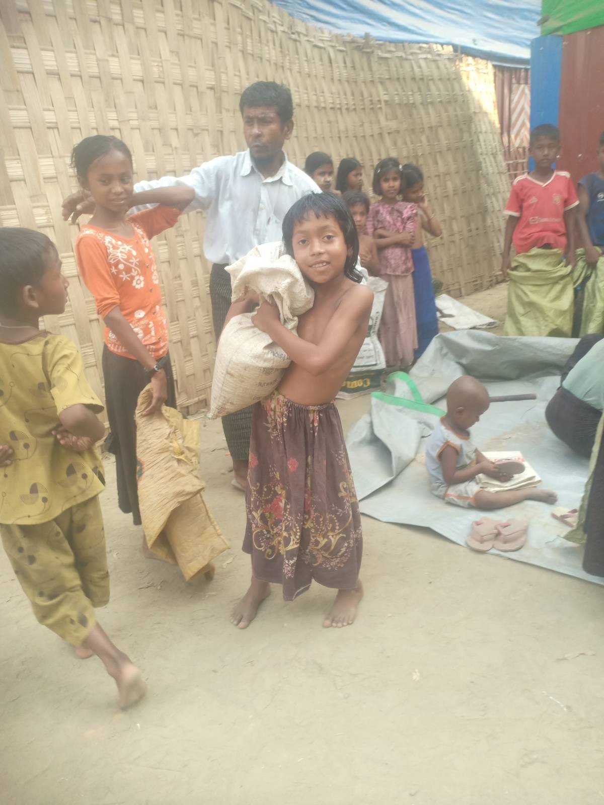 orphans and IDP communities which had not eaten for days received our supply delivery while SFH medics treated wounded .jpeg