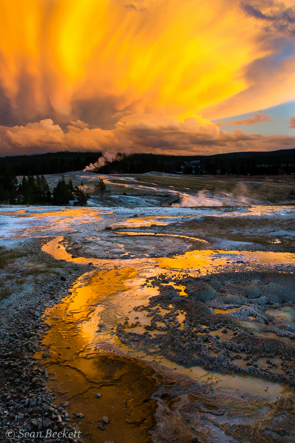 geysers and hot springs glowing at sunset