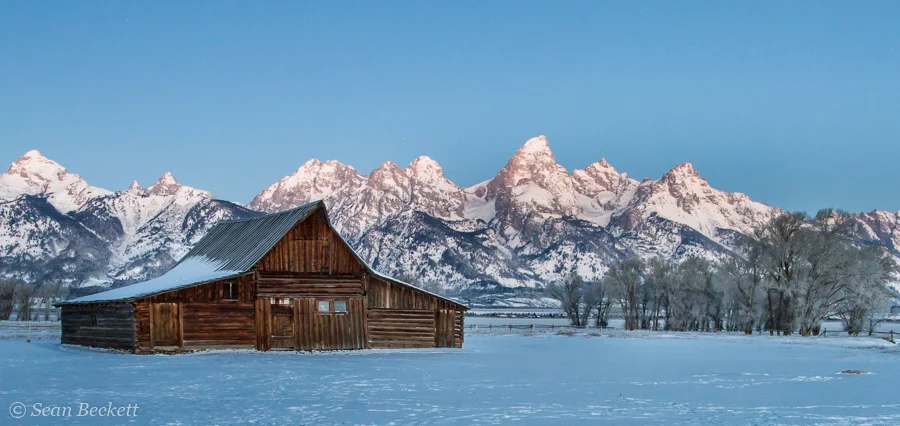 teton barn snowy sunrise