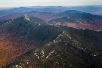 aerial view of Green mountains in fall foliage