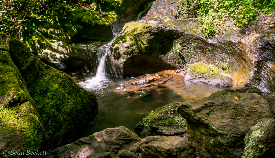 A small waterfall in a pothole of Miller Brook up near the top of Nebraska Notch in the Mt Mansfield State Forest.