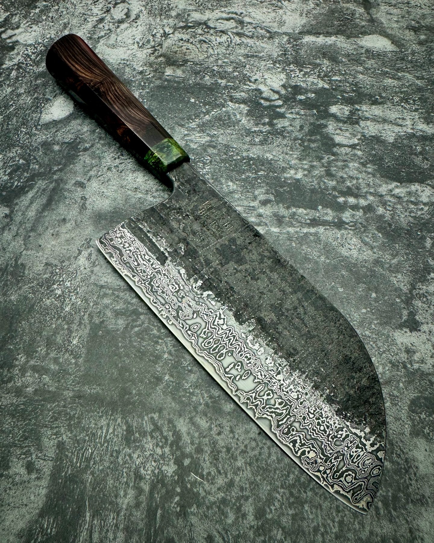 Custom order all finished up, a Damascus San mai Big Boy! This one has an apex ultra core at 66 Rockwell, with a 1095, 15n20 and nickel silver jacket. The handle is made with dyed and stabilized spalted burl for the bolster with an African Blackwood 