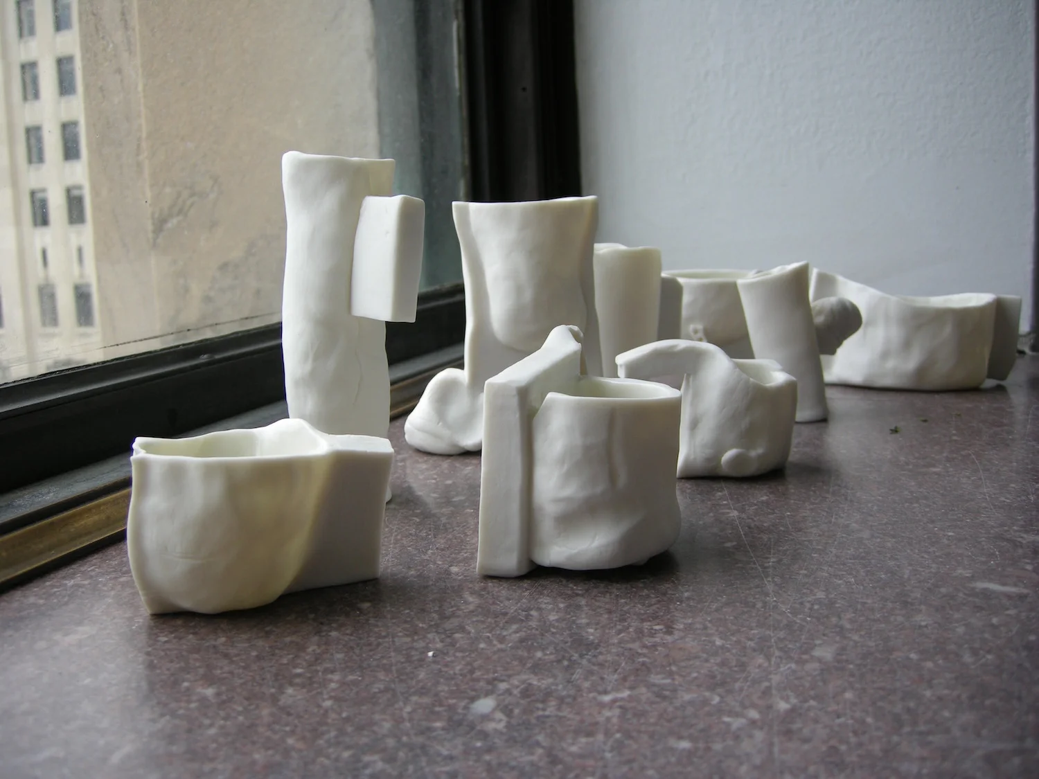 Collection of 9 Porcelain Vessels zuckerhosen NEXTSPACE.jpg
