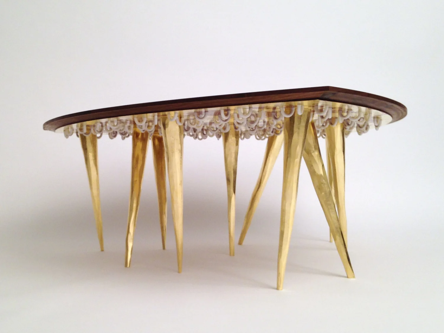 Reuleaux's Guest Cocktail Table by zuckerhosen. Part of the Gretchen and Ethan Davidson Collection - Bloomfield Hills, MI