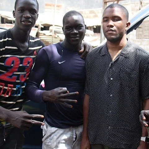Image of two Senegalese men and Frank Ocean.