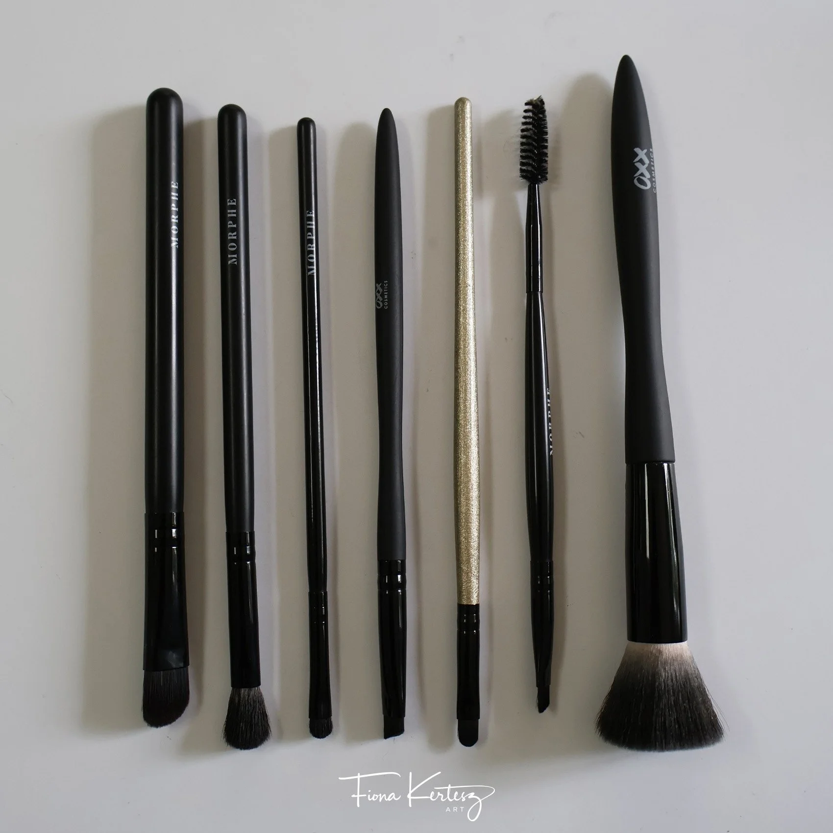 Makeup brushes used in charcoal drawings