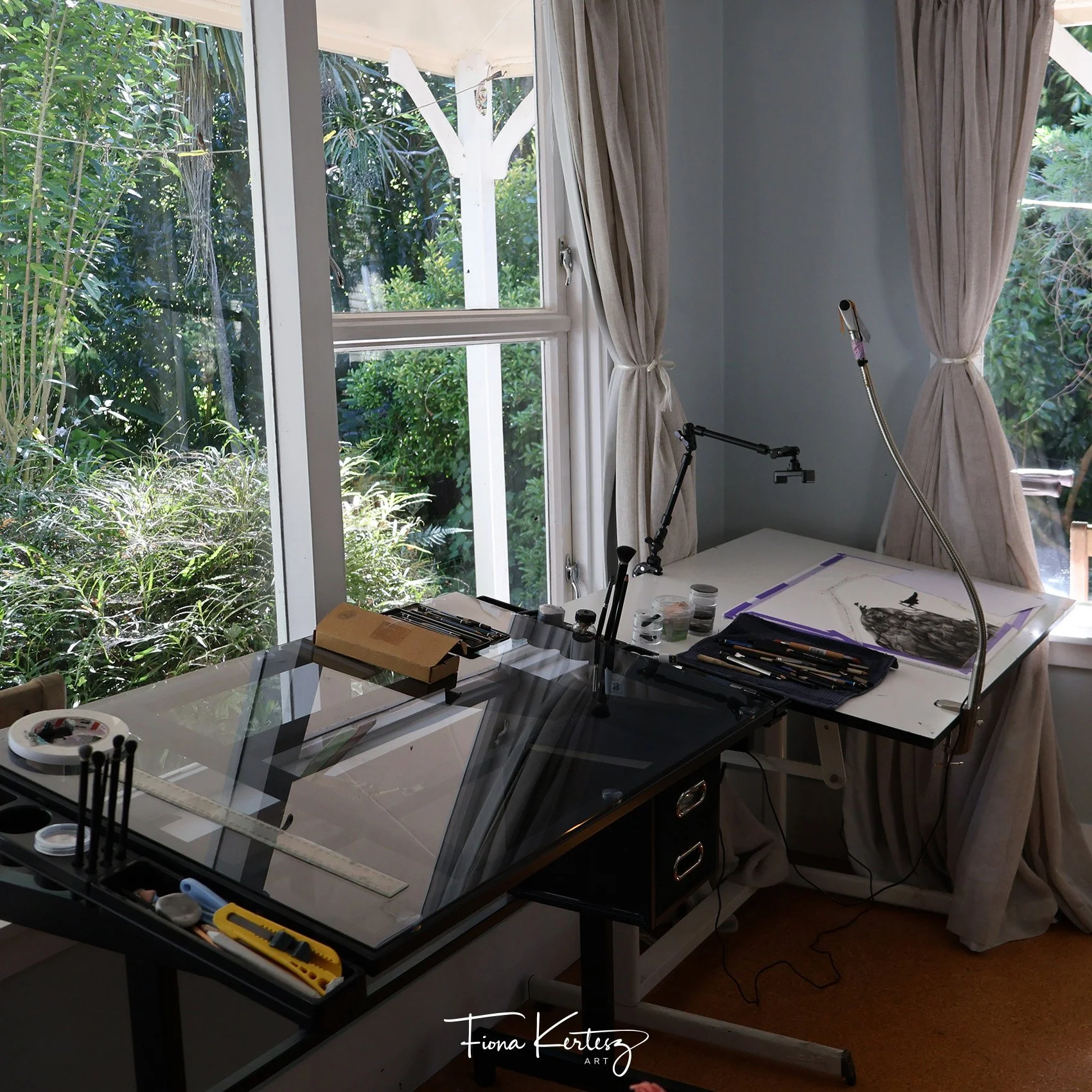 My two drawing desks, a glass and board one.