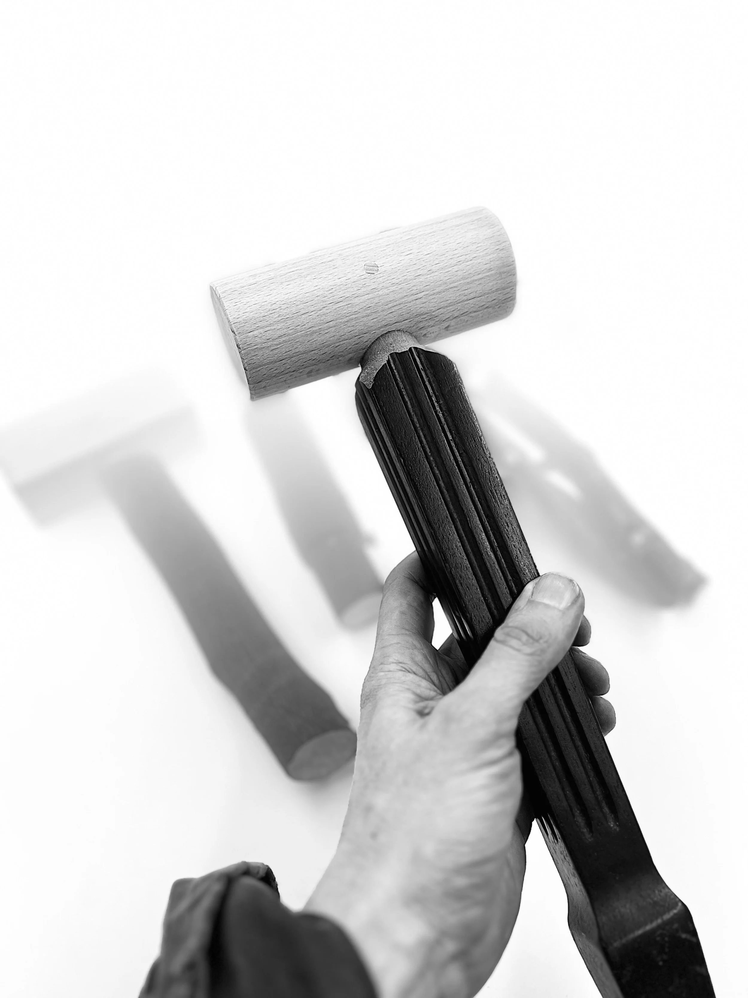 ChairLeg_mallet_bw_in_hand.jpeg