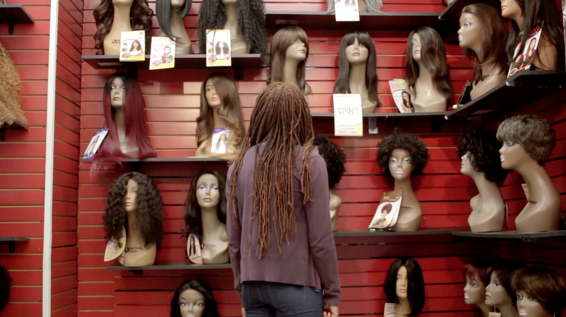 Eva navigating her way through a Black beauty supply store, from Like Fine Silk.