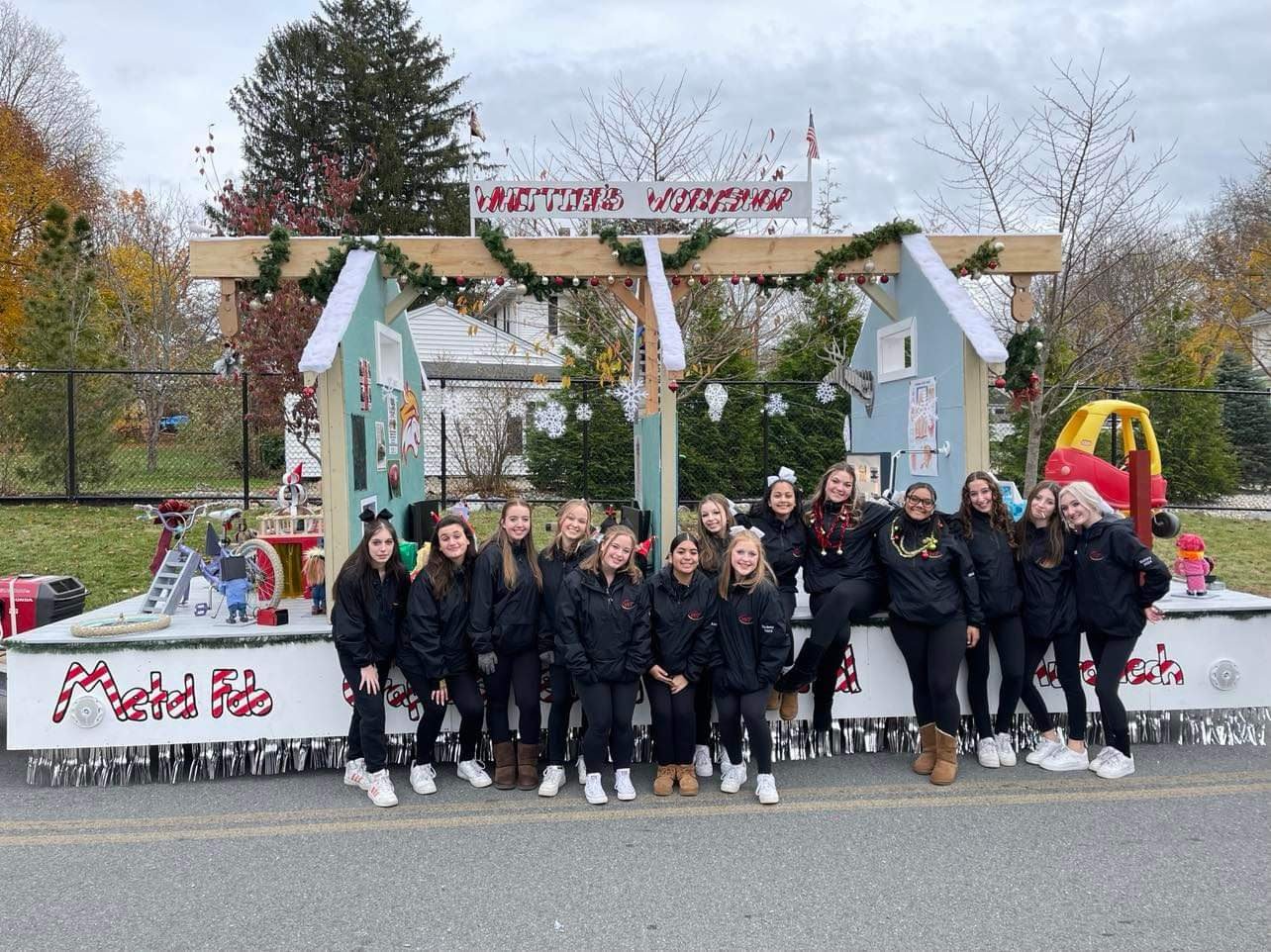   Whittier Tech cheerleaders accompanied the float along the route. (Photo Courtesy Whittier Tech)  