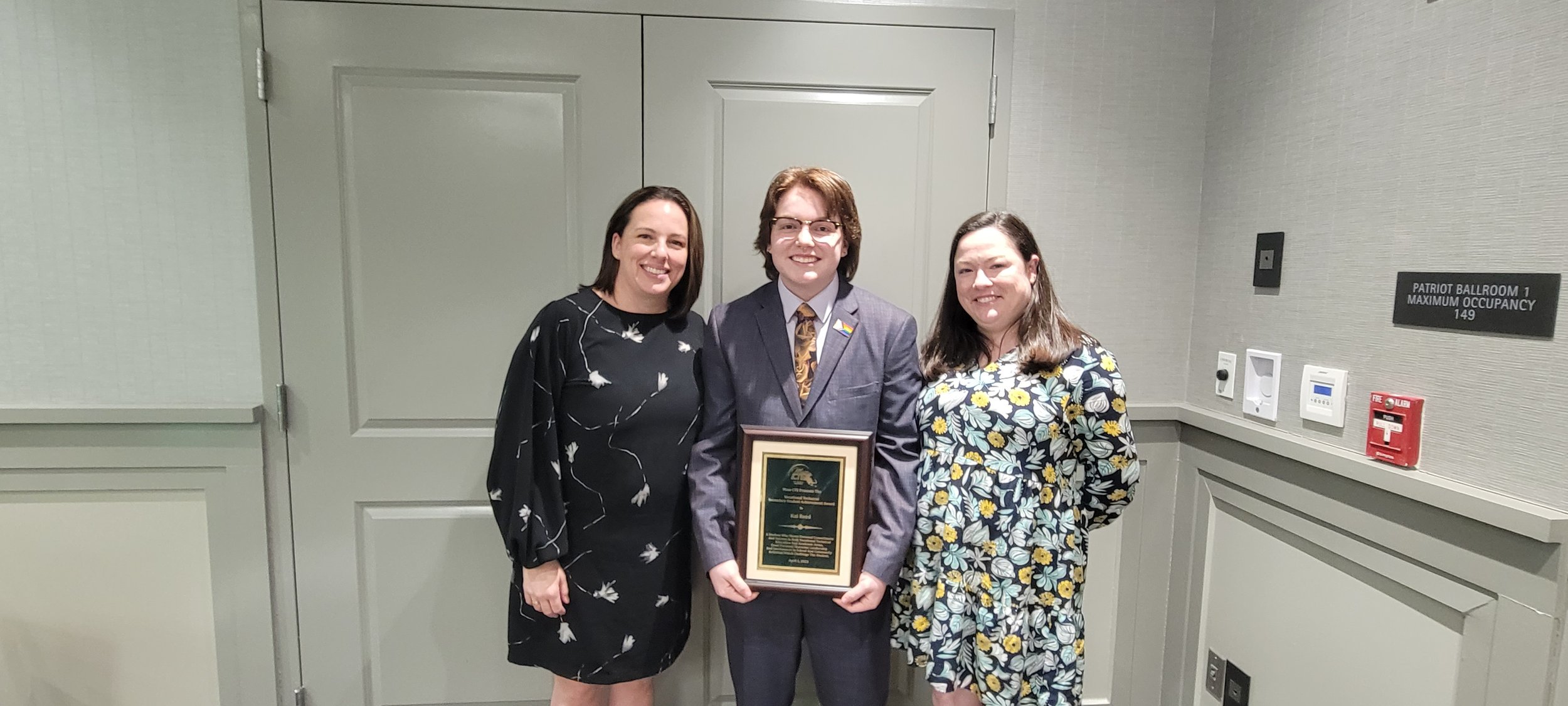  Kai Reed  (middle)  with mother Penny Reed and English Instructor Katie Staunton 