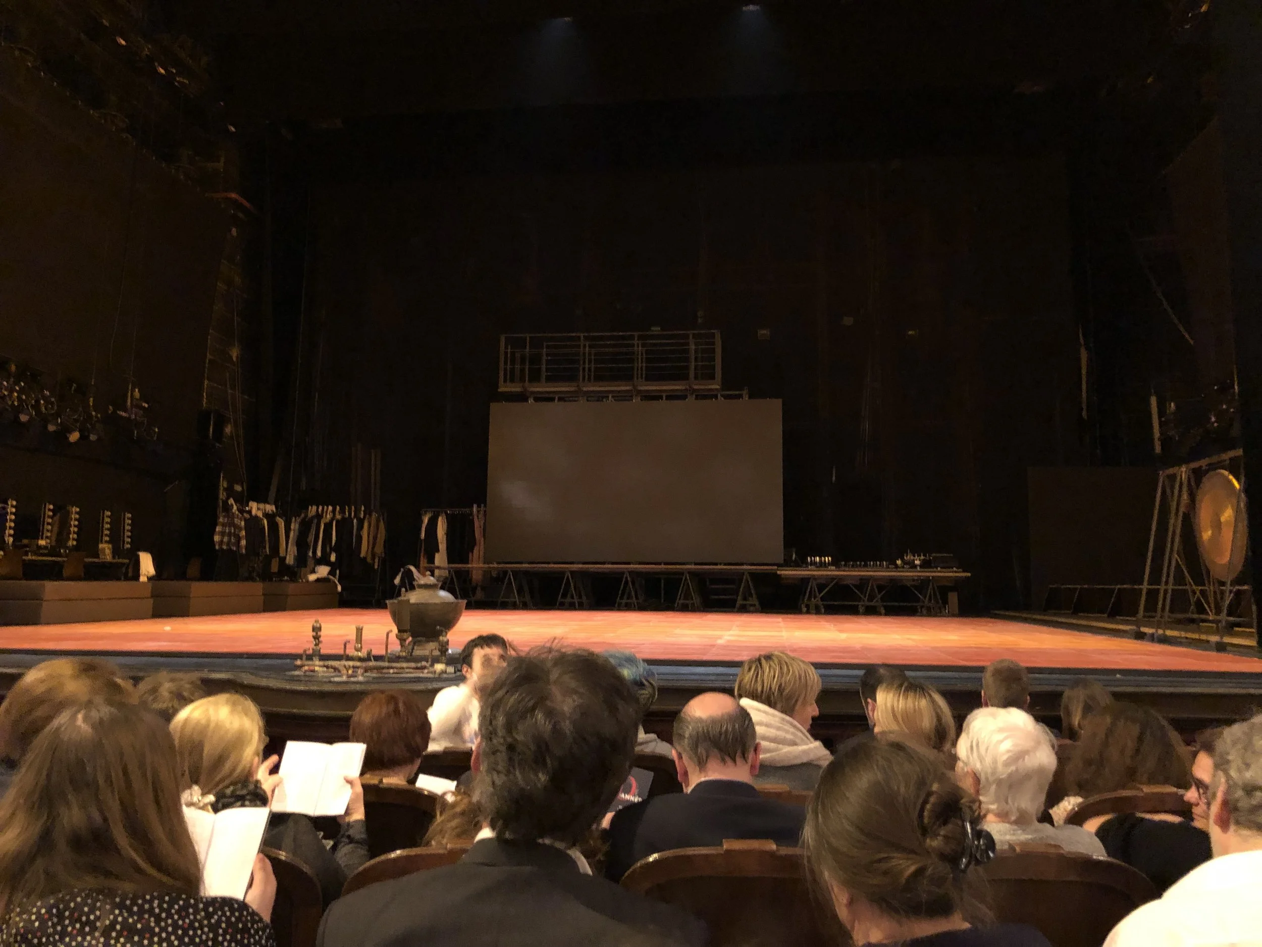The cavernous stage before ‘curtain’ up with part of the capacity (862 persons) crowd in the foreground
