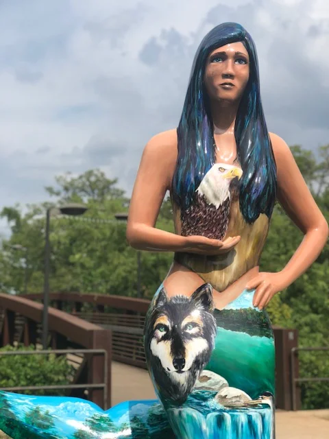 Eagle and wolf mermaid statue.jpg