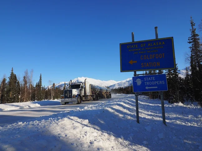 Ice trucker passing Coldfoot Camp (population 10) at Mile 175