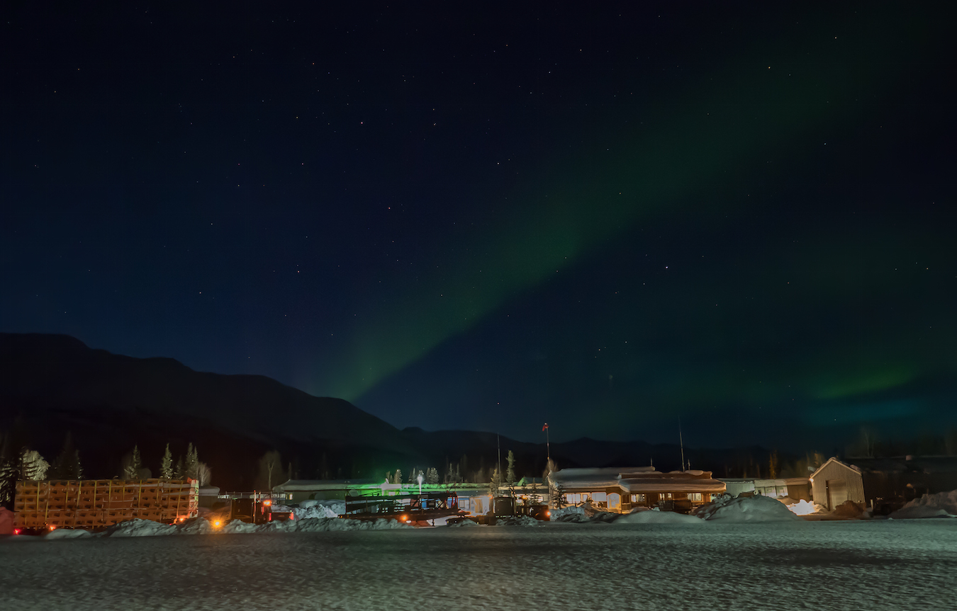 Northern Lights peaking out over the Coldfoot gas station and rest stop.