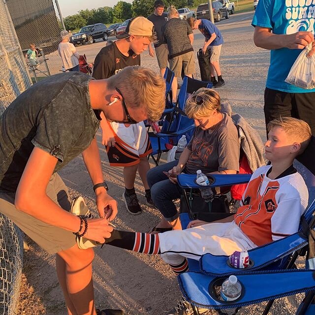 Baseball is a bit different. 
The fans are sparse. 
But having the fan who&rsquo;ll tie his brother&rsquo;s cleats makes a good season no matter what. 👊🏻 #showingbrotherlylove 💙 
#therearemoments 😆 
#easingbacktolife #outdoorsports #baseballseaso