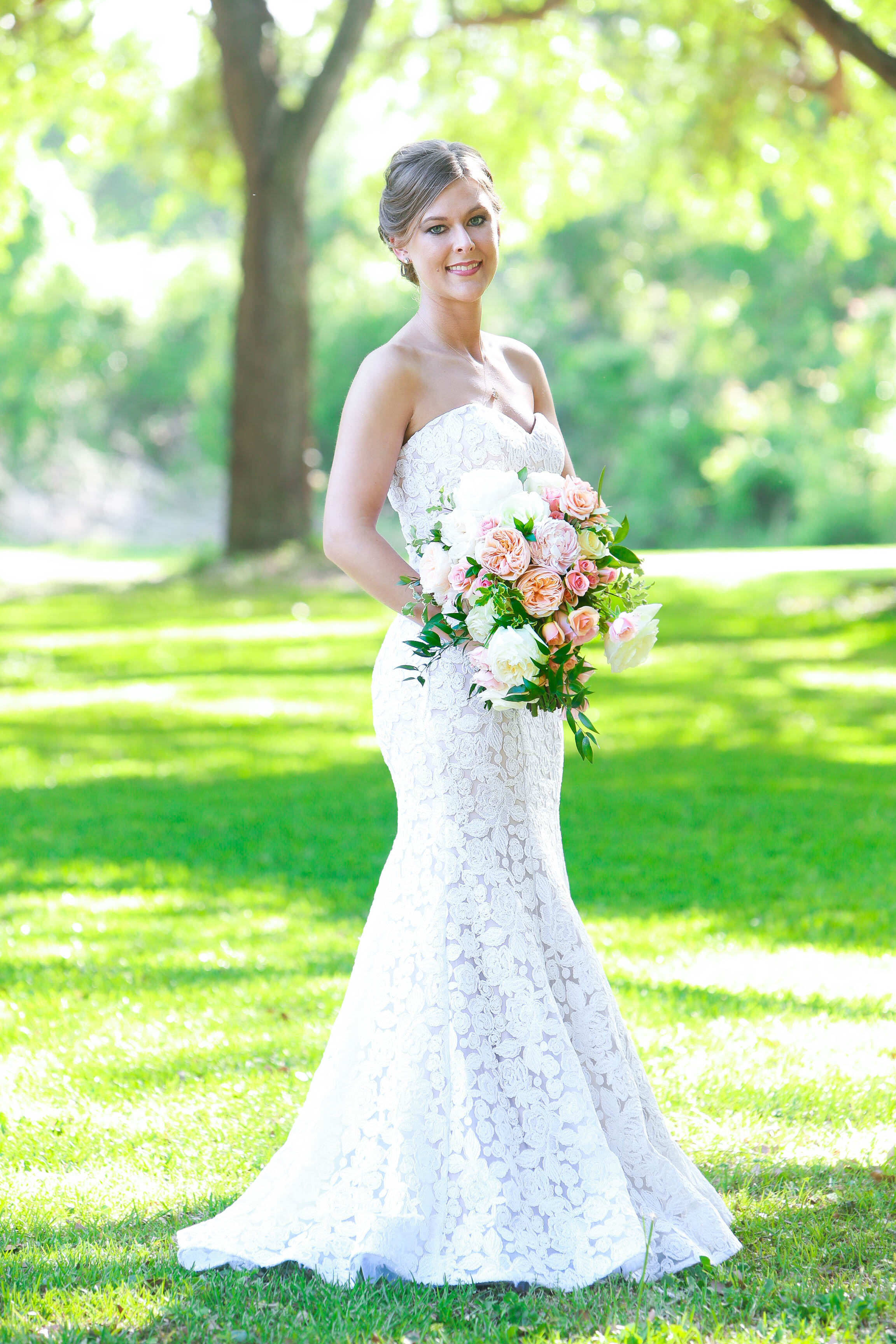  Classic bridal portrait with vibrant green colors in the background 