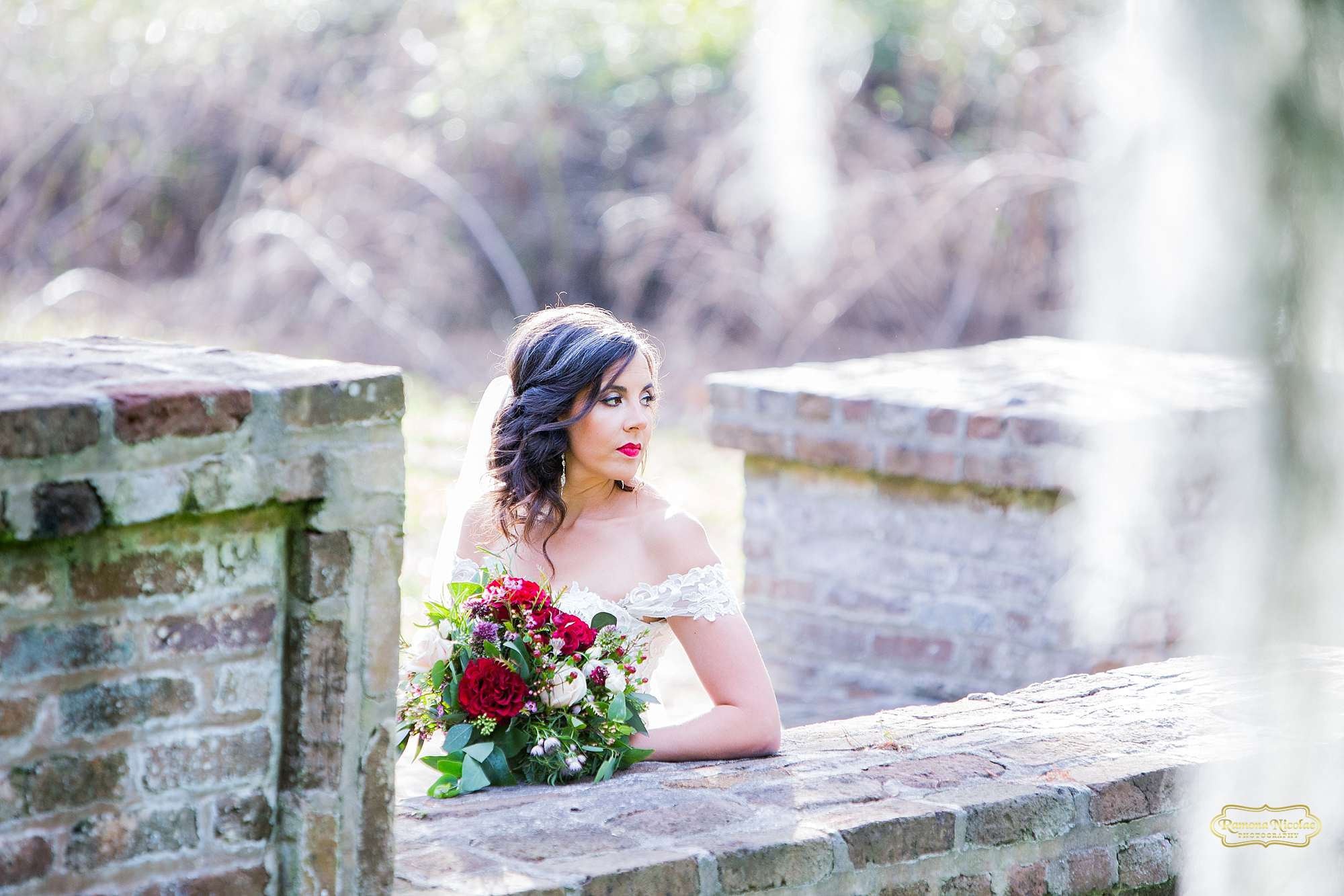 bride on the steps at brookgreen gardens with spanish moss for bridal session with ramona nicolae myrtle beach wedding photographer-4.jpg