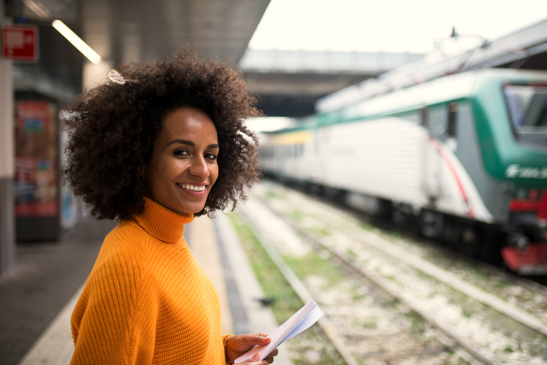 Black woman on train.png