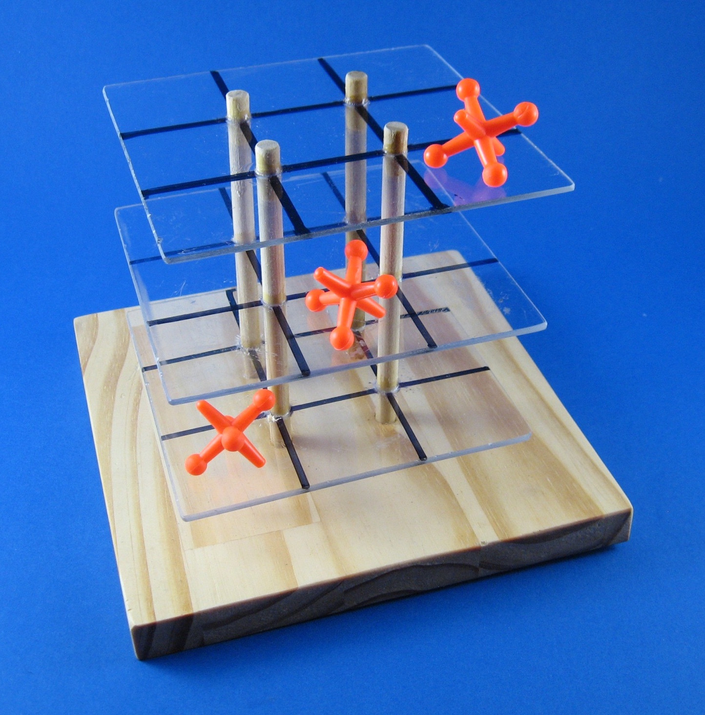 Three-dimensional tic-tac-toe can be played on three arrays of 3x3