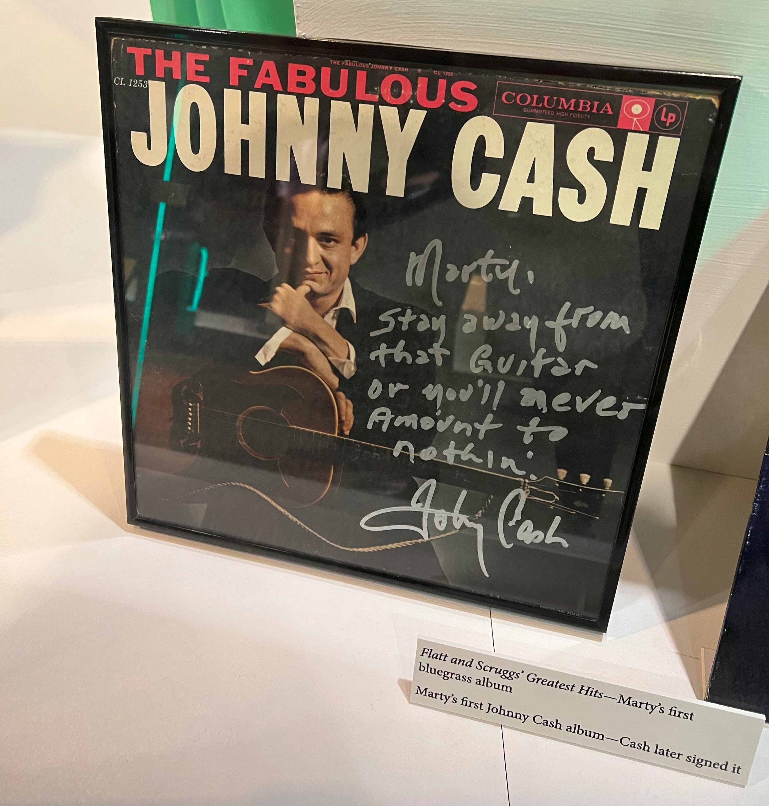 Marty Stuart's first Johnny Cash album, later signed by the man himself