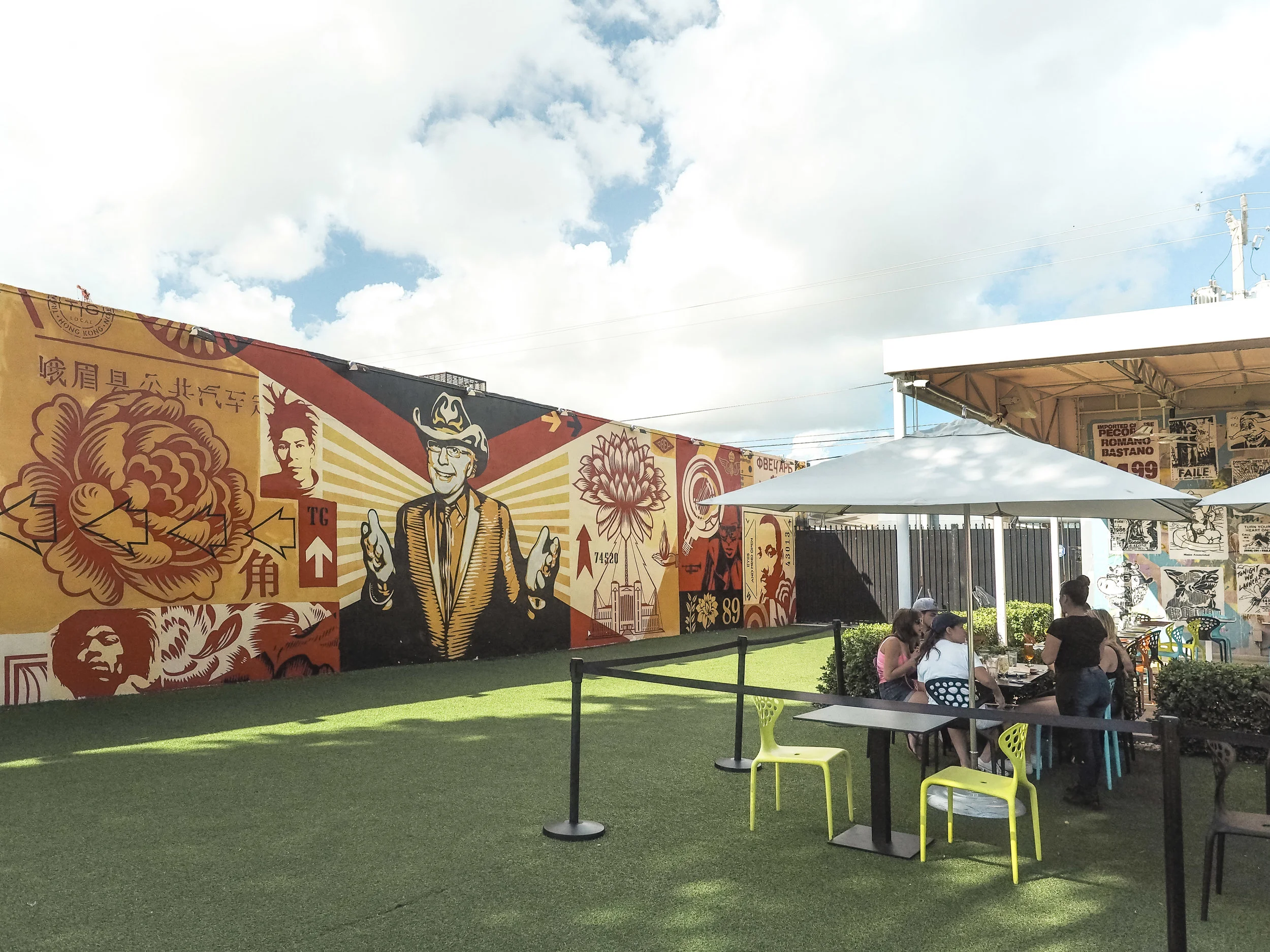 Miami is much more than beaches and tan lines. Wynwood is a thriving art district where everything from buildings to light poles to sidewalks are covered in bright and colorful street art. Take a walk through the neighborhood on your next Miami vacation. #wynwood #wynwoodwalls #miami #streetart