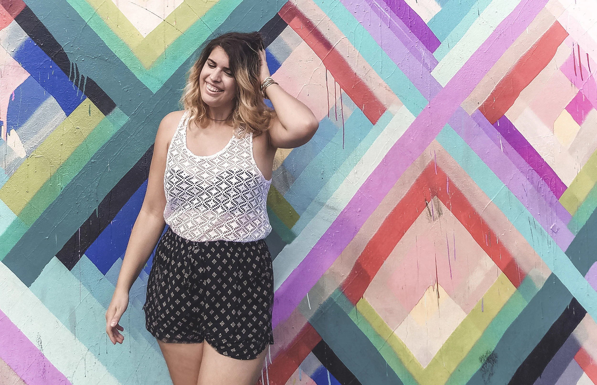 Miami is much more than beaches and tan lines. Wynwood is a thriving art district where everything from buildings to light poles to sidewalks are covered in bright and colorful street art. Take a walk through the neighborhood on your next Miami vacation. #wynwood #wynwoodwalls #miami #streetart