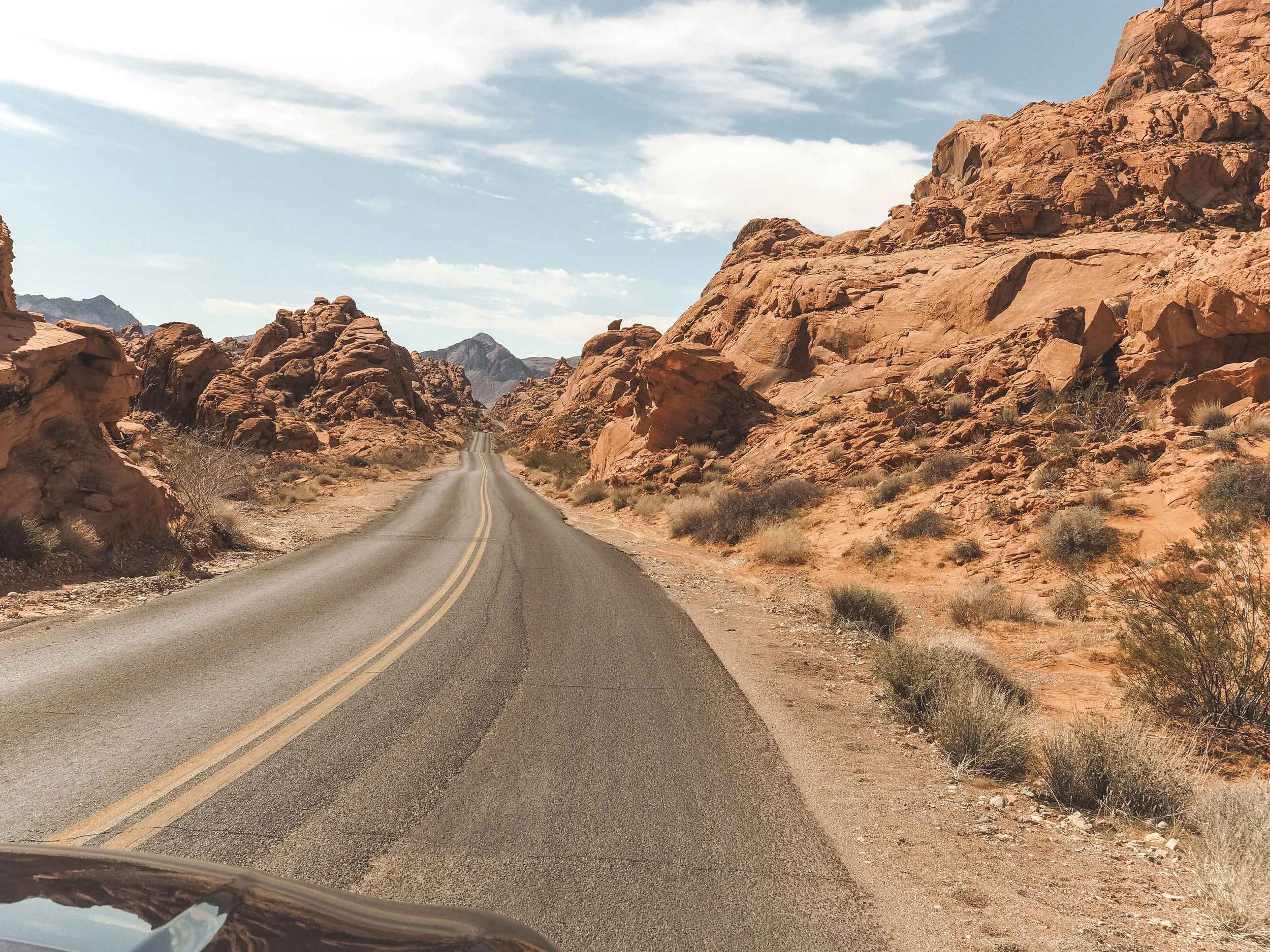 Valley of Fire state Park is home to some amazing hiking trails in the middle of the Nevada desert. Explore views of colorful rock formations and even ancient petroglyphs! #valleyoffire #nevada #statepark #hiking