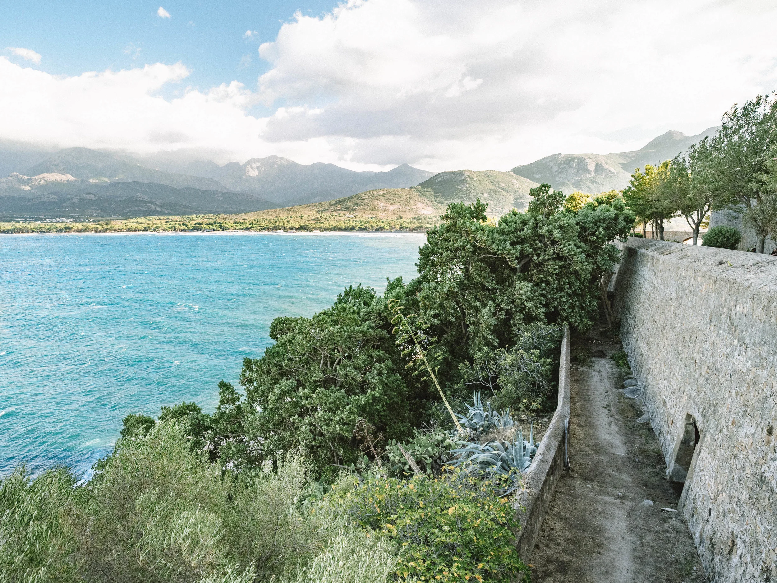 Corsica is a beautiful, secluded island in the Mediterranean Sea. With countless hiking trails, pristine beaches and small towns, it’s the perfect way to escape the hustle of a European vacation for a few days. Take a quick flight to Calvi, Corsica for an amazing experience different than anywhere else in France! #france #corsica #hiking #island