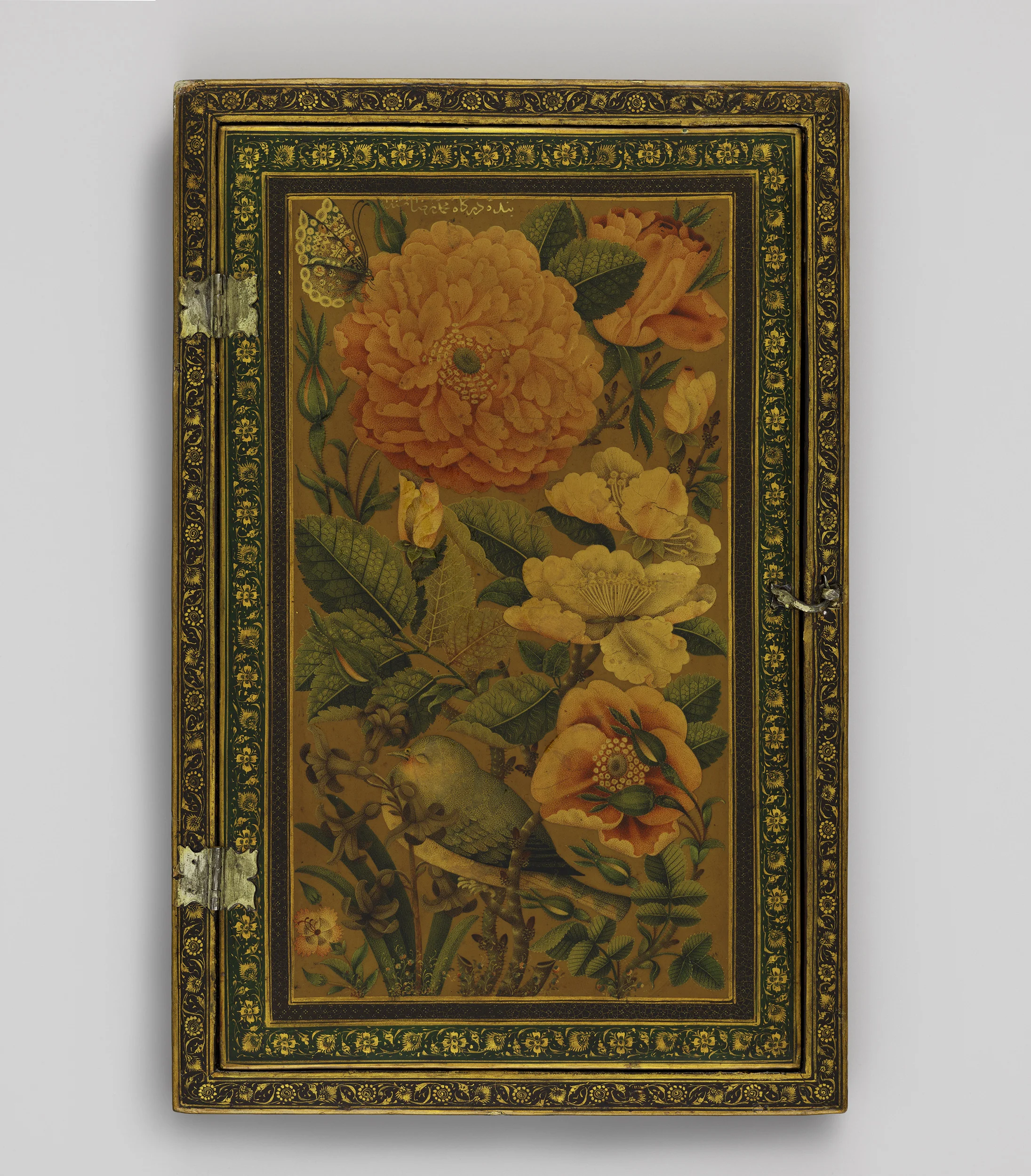 A decorative rectangular wooden box with intricate gold, green, and black floral patterns around the border, featuring a painting of various vibrant orange and yellow flowers, green leaves, and a butterfly on a gold background.