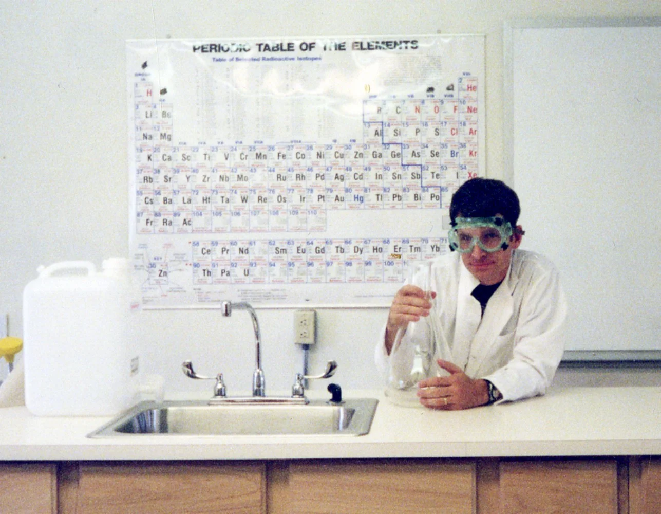 Matt in chemistry lab safety apparel at the Native American Preparatory School (now closed), where he taught chemistry and physics; near Rowe, New Mexico