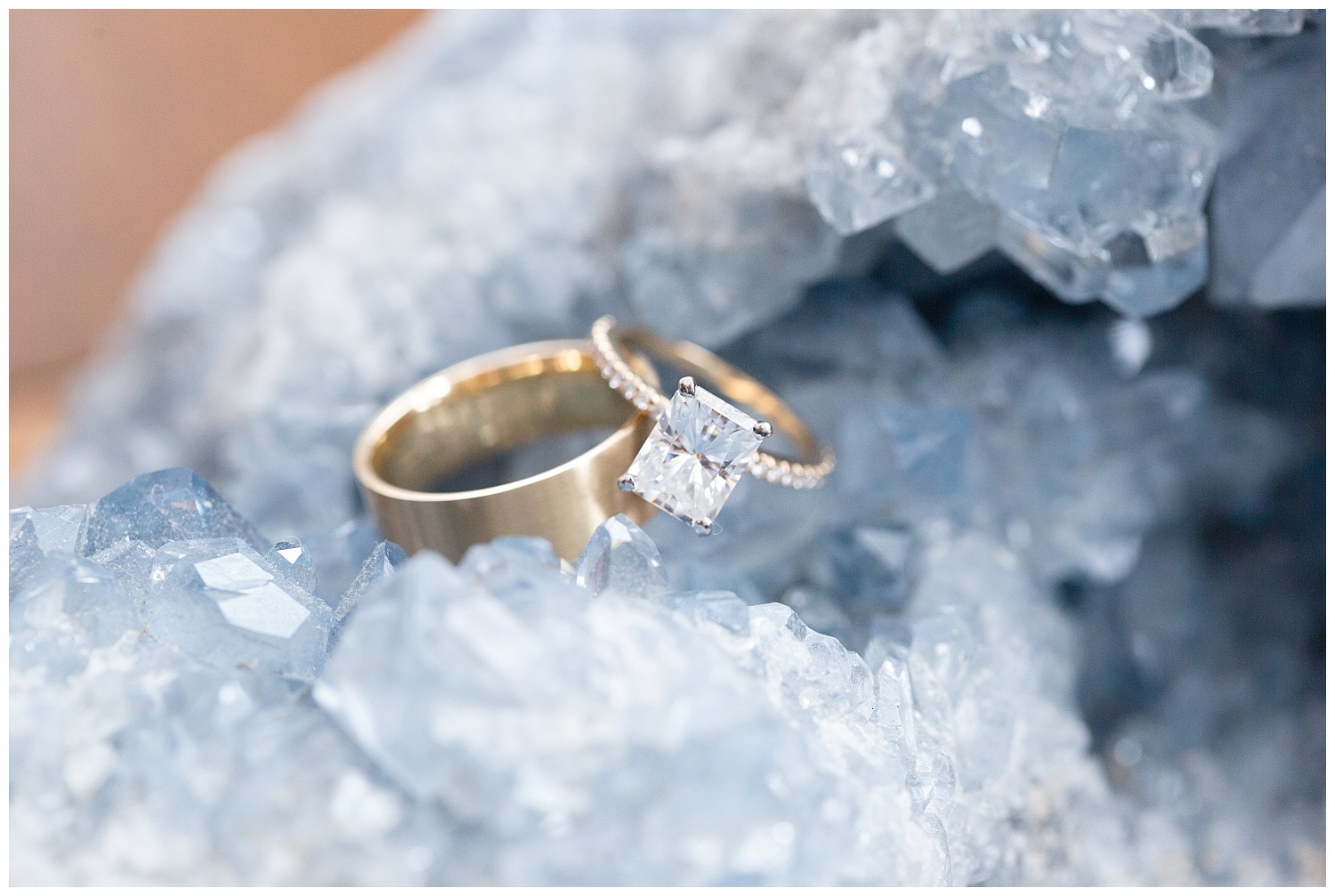 emerald cut diamond ring on a blue geode stone