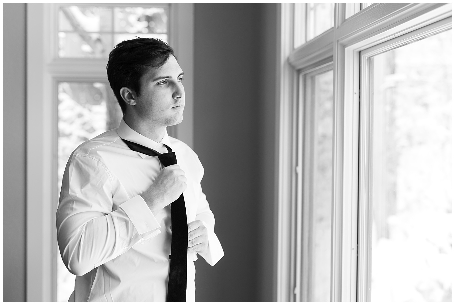 A groom getting ready for his wedding day in Breckendridge, Colorado