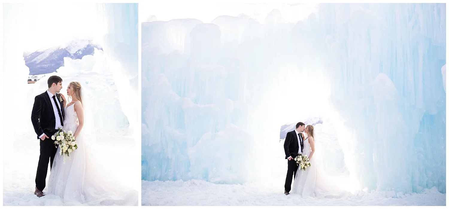 A bride and groom look at each other longingly under an ice sculpture