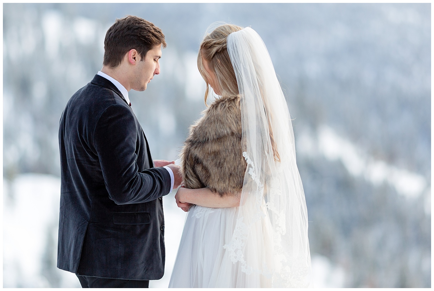 A groom reading his vows to his bride in Breckenridge, Colorado