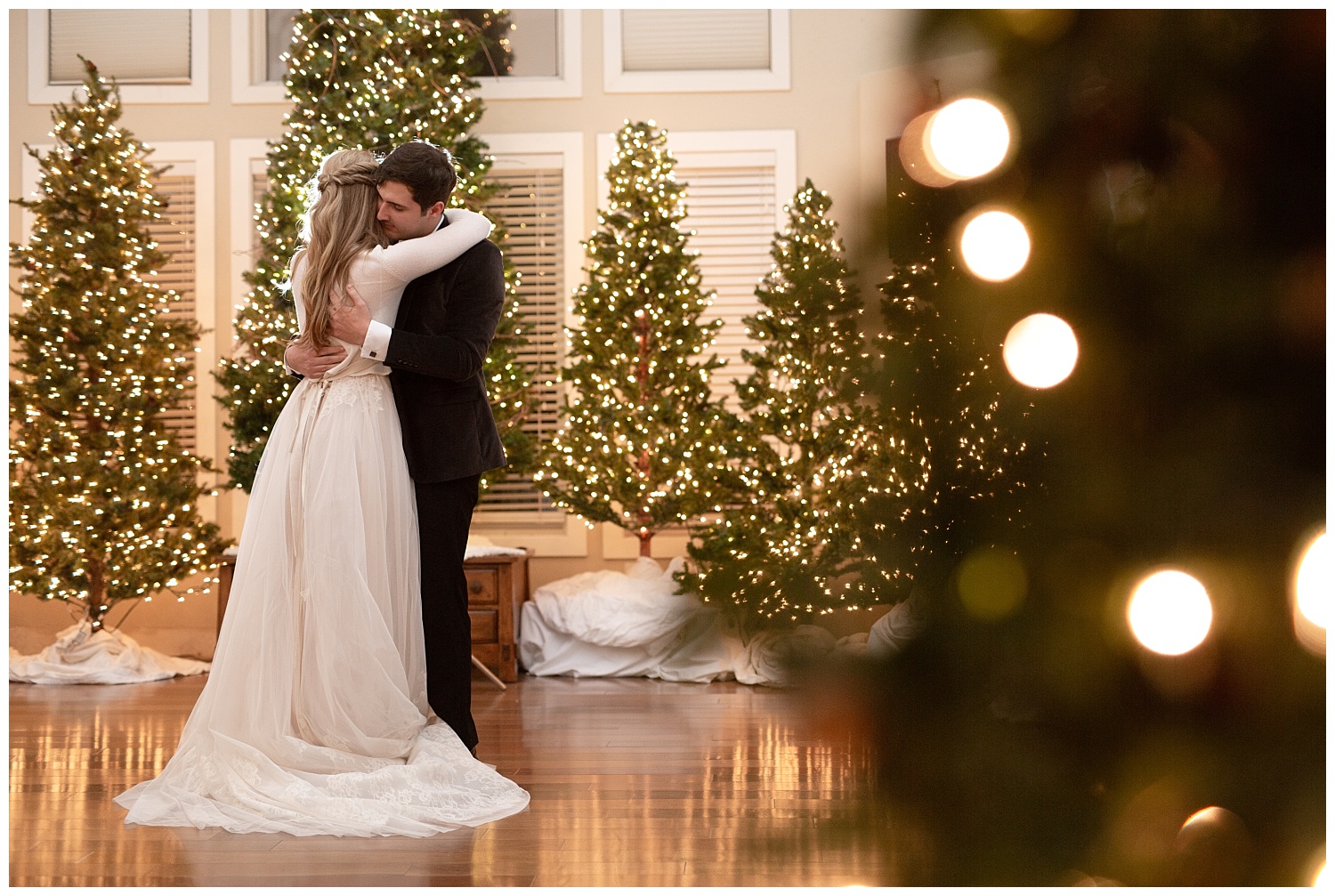 Twinkle lights surround the bride and groom as they dance together