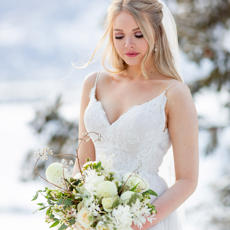 bride-looking-at-bouquet.jpg