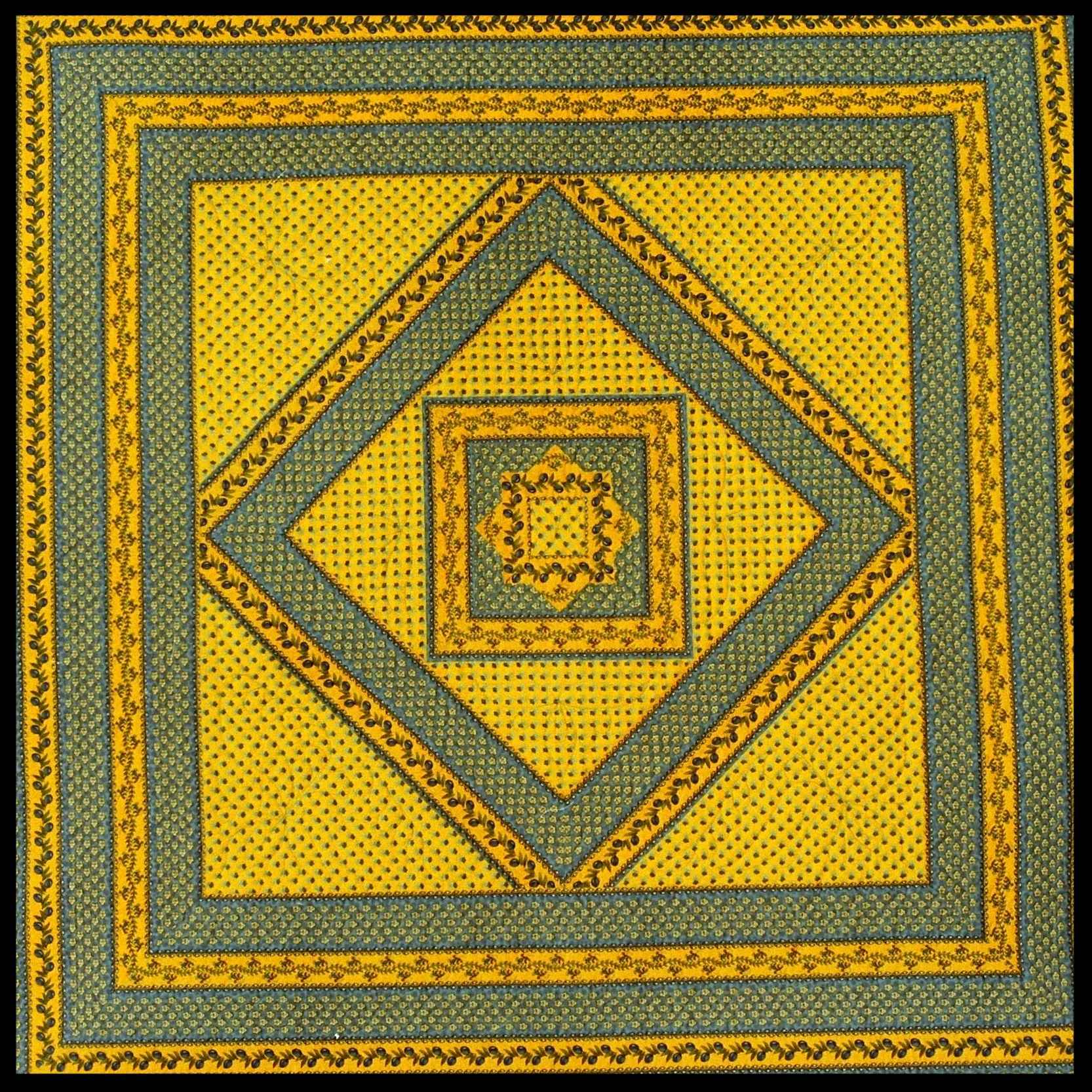  New quilt made with cotton tablecloths. 