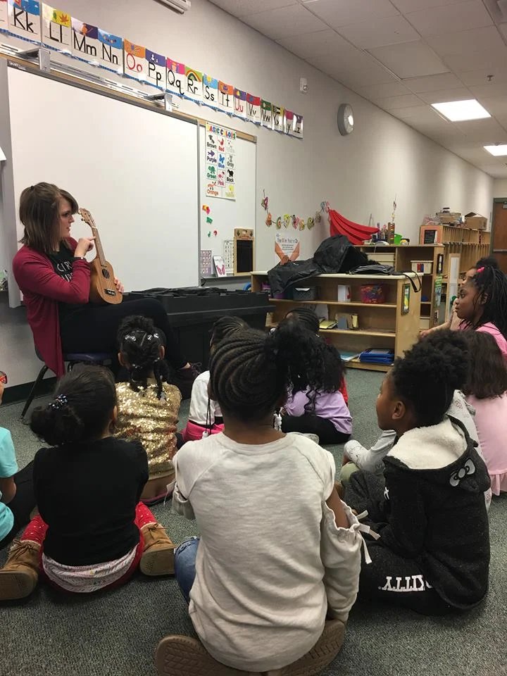 Kids from LGR circled ‘round to observe ukulele instruction after school!