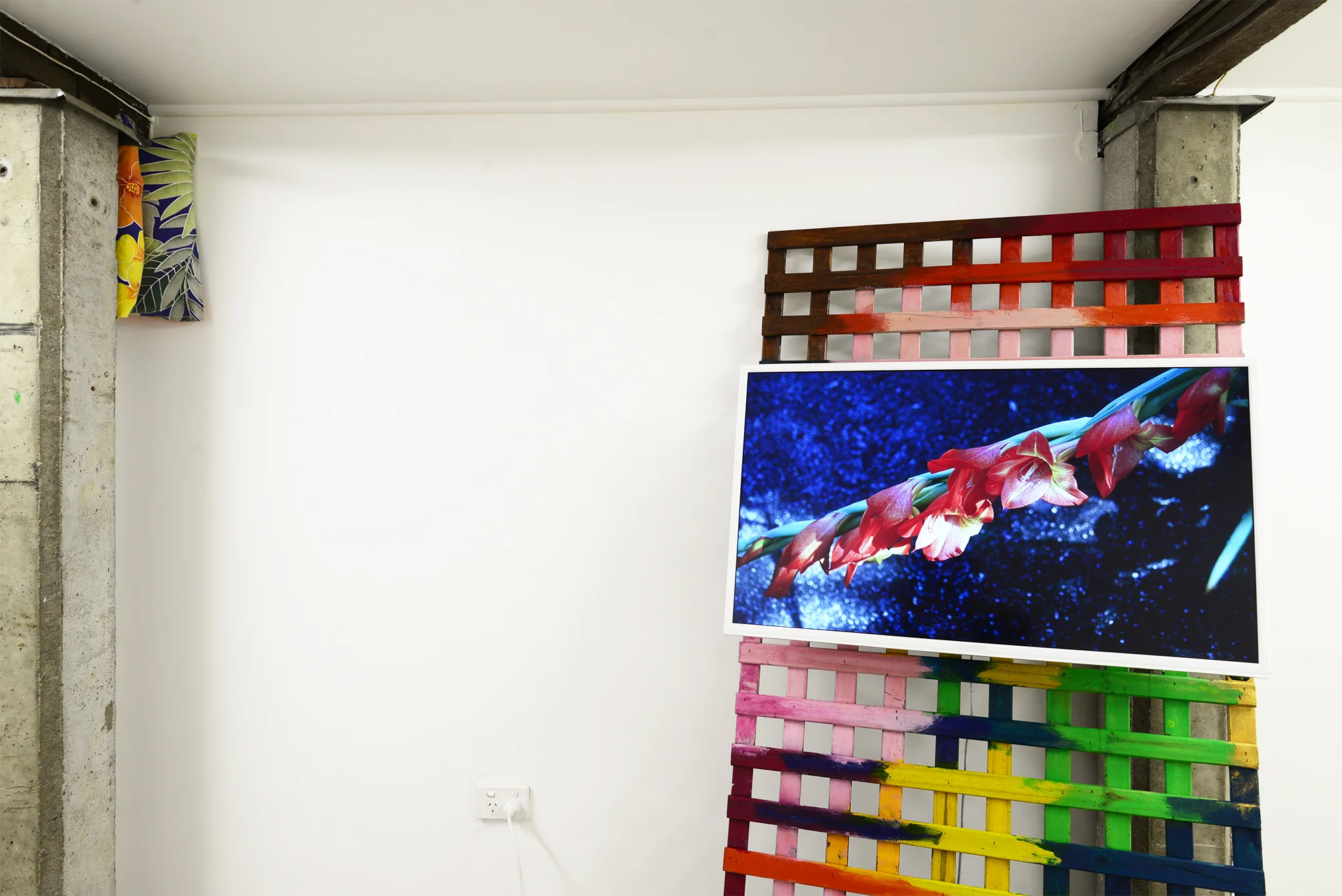 Left: Rest 2018 pillow, pillowcase; Right: Highgate Hill c.1998/2018 slideshow on flatscreen TV: 35mm Kodachrome slides transferred to JPEG, 0:10, silent