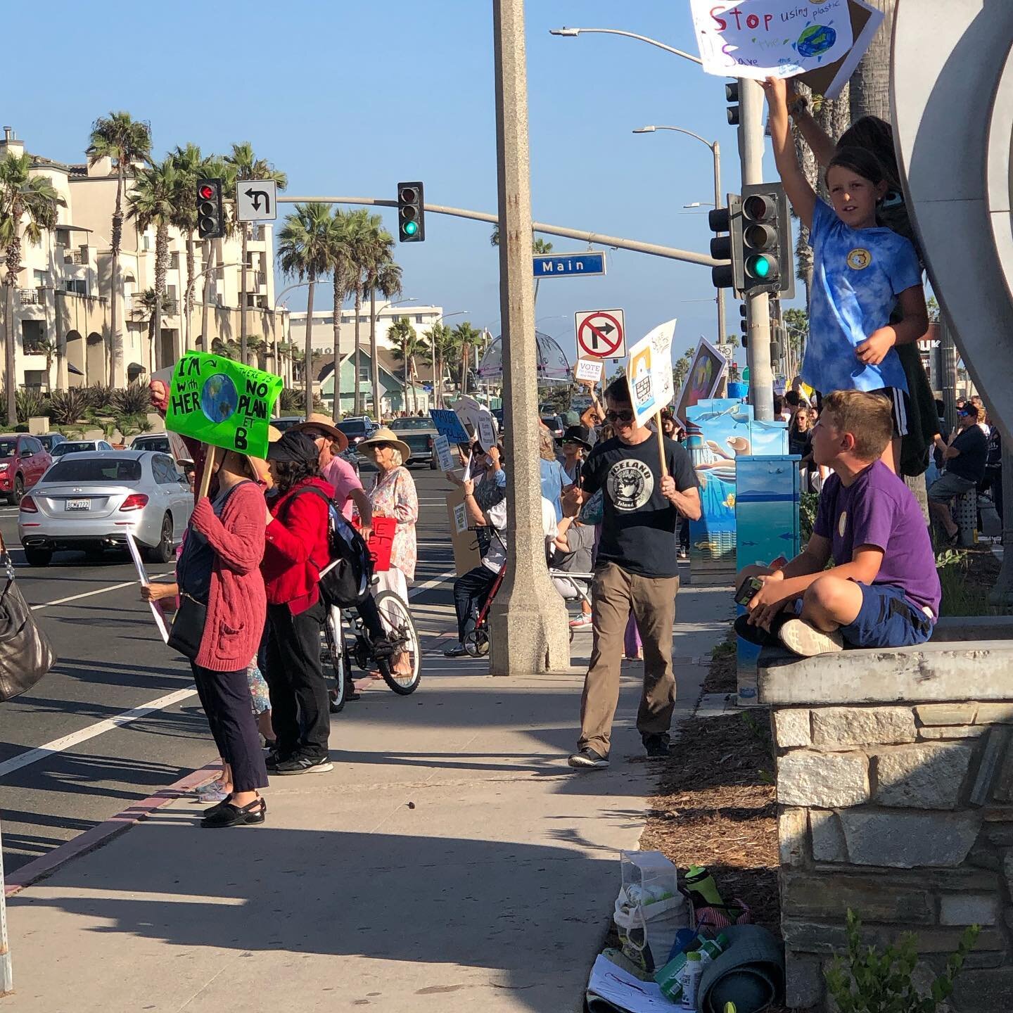 A small but mighty and loud climate strike in Huntington Beach.