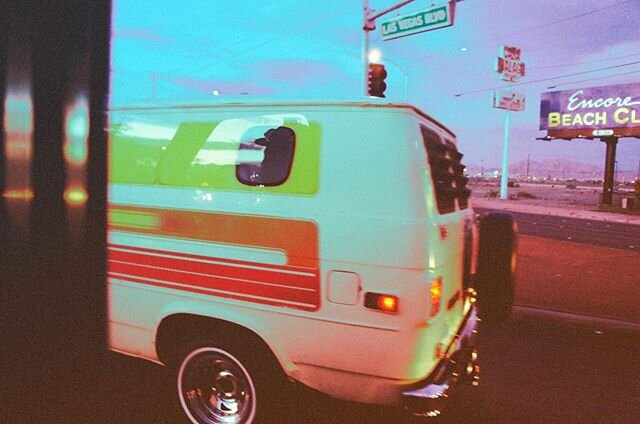One time in Vegas, there was a creepy van, but a beautifully creepy van and I barely knew how to frame a photo or use the manual settings.... just a glancing photo that came out kinda cool. I like all the small details. The van graphics, street signs
