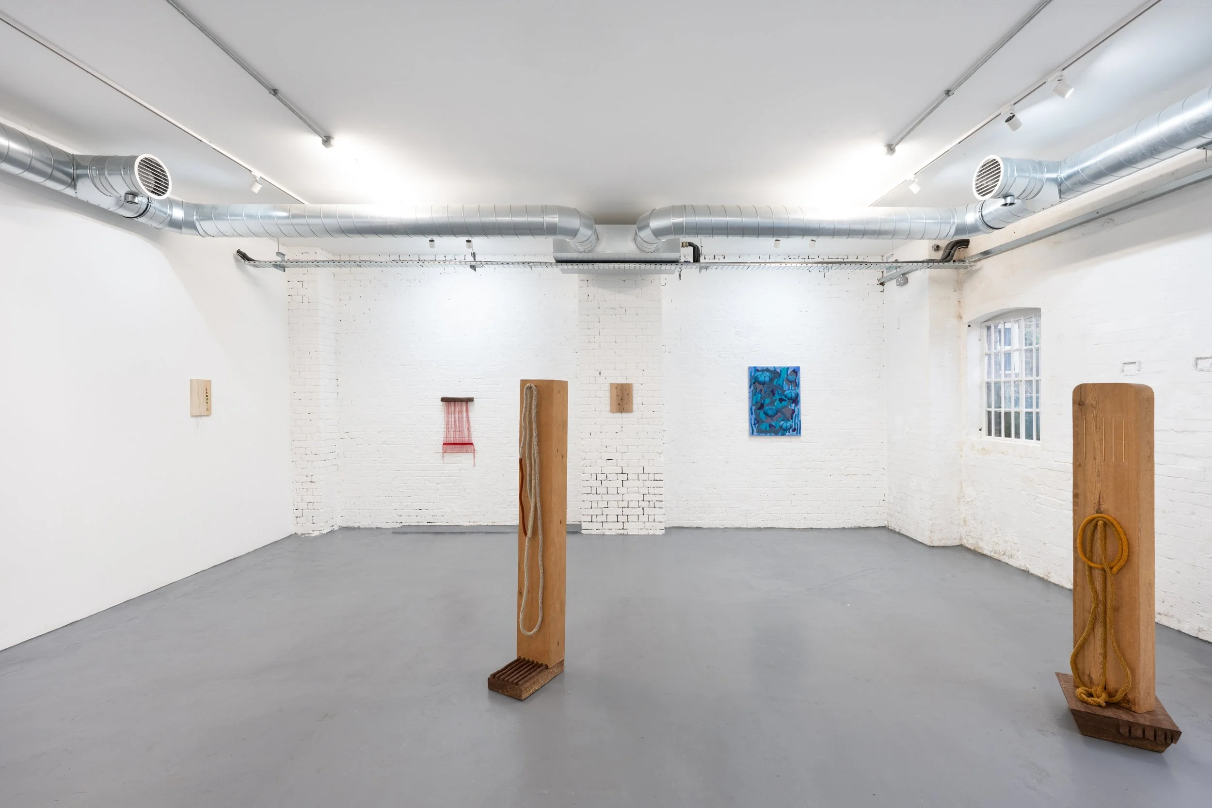 Tonico Lemos Auad (sculptures and works shown on the left) & Goia Mujalli (painting on the right side)