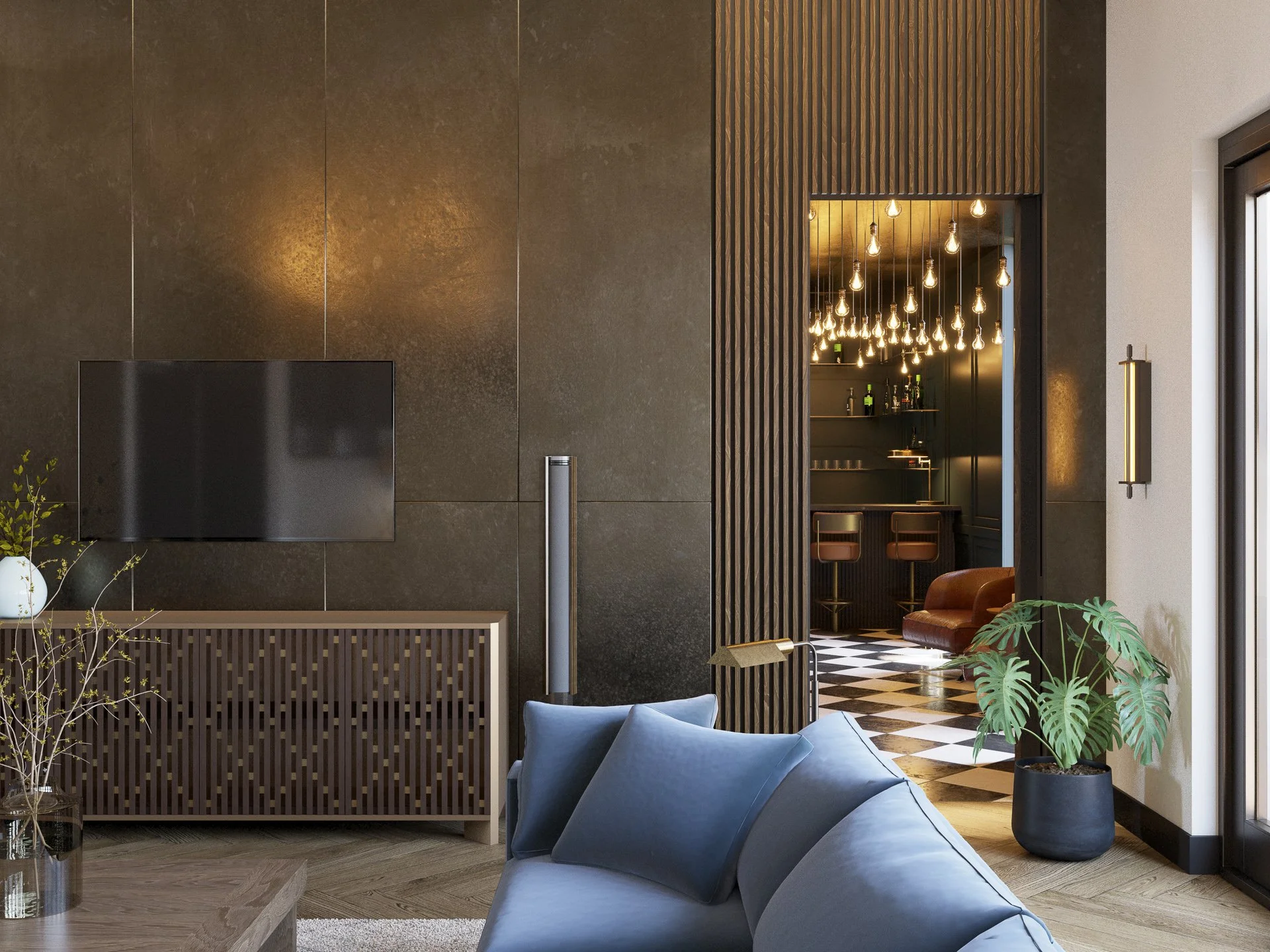 Modern living room with a dark textured wall, a blue sofa with pillows, a potted plant, and a black and white checkered floor leading to a bar area illuminated by hanging light bulbs.